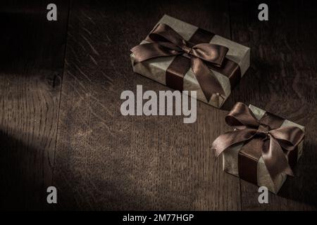 two vintage gift boxes on wooden background Stock Photo