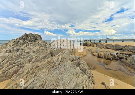 Beach view near Palm Cove Jetty with beautiful rocks formation Stock Photo