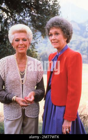 LANA TURNER and JANE WYMAN on set location candid at the start of filming of Lana Turner's 1st episode (of 6) FAMILY REUNION in the TV Series FALCON CREST created by EARL HAMNER Jr. aired on May 6th 1982 production companies Amanda & MF / Lorimar Productions publicity for CBS (Columbia Broadcasting System) Stock Photo