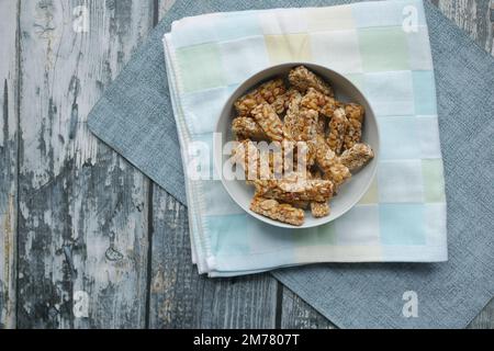 peanuts sweet candy in a bowl on table  Stock Photo