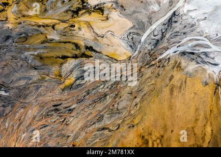 Aerial view of the famous red mud disaster site, abstract lines, surreal landscape, icelandic feeling. Stock Photo