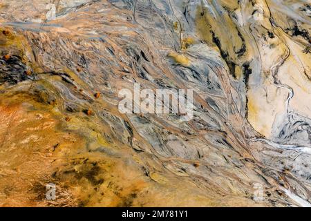 Aerial view of the famous red mud disaster site, abstract lines, surreal landscape, icelandic feeling. Stock Photo