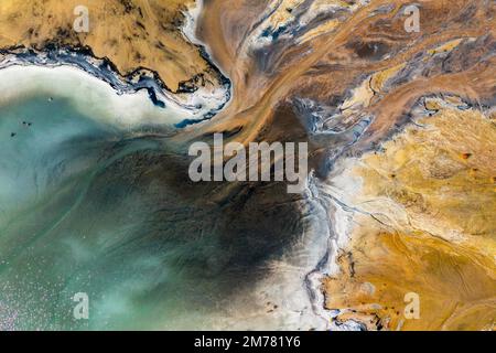 Aerial view of the famous red mud disaster site, abstract lines, surreal landscape, icelandic feeling. Stock Photo