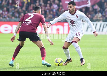 Nemanja Radonjic of Torino FC  and Dylan Bronn of US Salernitana  competes for the ball with during the friendly football match US Salernitana 1919 v FC Torino  at Arechi stadium Stock Photo