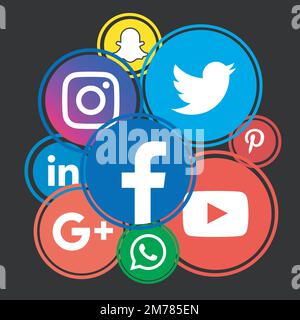 Kiev, Ukraine - October 22, 2018: Popular social media icons such as: Facebook, Twitter, pinterest, LinkedIn and others, printed on white paper. Stock Vector