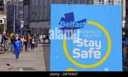 Stay safe sign in the city center of Belfast - BELFAST, UK - APRIL 25, 2022 Stock Photo