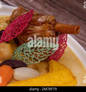 Lamb smil pie served with fried polenta, carrot, turnip, mushroom and sauce Stock Photo