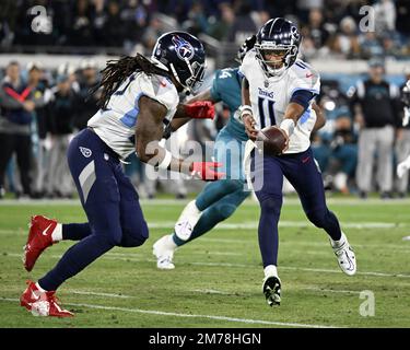 January 7, 2023: Tennessee Titans quarterback Joshua Dobbs (11) is sacked  by Jacksonville Jaguars defensive end Roy Robertson-Harris (95) during a  game in Jacksonville, FL. Romeo T Guzman/CSM/Sipa USA.(Credit Image: © Romeo