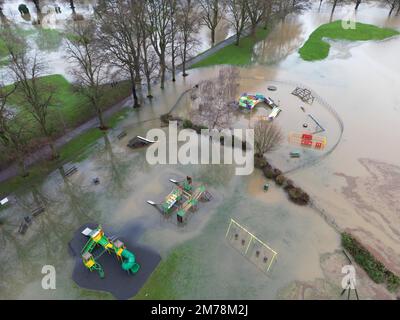 Hereford, Herefordshire, UK – Sunday 8th January 2023 – UK Weather – Aerial view of flooding in a playground at Bishops Meadow adjacent to the River Wye in Hereford. At 4pm the River Wye was at 4.65m and rising as it flows through Hereford. More rain is forecast. Photo Steven May / Alamy Live News Stock Photo