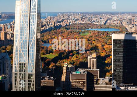 Aerial view of Central Park in full Fall colors with new supertall building and skyscrapers of Midtown Manhattan. New York City Stock Photo