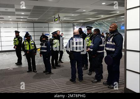 Chinatown, London, UK. 8th January 2023. Heavy police watching No trousers on the London Underground for No Trousers Day (No Pants) on the London Underground, London, England. Credit: See Li/Picture Capital/Alamy Live News Stock Photo