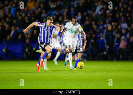 Hillsborough Stadium, Sheffield, England - 7th January 2023 Alexander Isak (14) of Newcastle United breaks away from Mark McGuinness (34) of Sheffield Wednesday - during the game Sheffield Wednesday v Newcastle United, Emirates FA Cup,  2022/23, Hillsborough Stadium, Sheffield, England - 7th January 2023 Credit: Arthur Haigh/WhiteRosePhotos/Alamy Live News Stock Photo