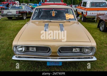 Iola, WI - July 07, 2022: High perspective front view of a 1967 Plymouth Barracuda Fastback at a local car show. Stock Photo