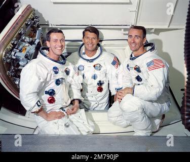 Cape Canaveral, United States. 22 May, 1968. NASA prime crew of the first manned Apollo space mission from left to right; Donn Eisele, Wally Schirra Jr, and Walter Cunningham, at the hatch of the capsule on Launch Pad 34 at the Kennedy Space Center, May 22, 1968 in  Cape Canaveral, Florida. Cunningham died January 4, 2023 at 90-years-old, the last surviving member of the NASA Apollo 7 mission. Stock Photo