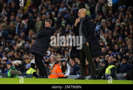 Chelsea manager Graham Potter (left) and Manchester City manager Pep Guardiola on the touchline during the Emirates FA Cup third round match at the Etihad Stadium, Manchester. Picture date: Sunday January 8, 2023. Stock Photo