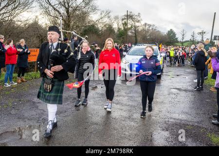 Ballylickey, West Cork, Ireland. 8th Jan, 2023. St. Colums (Cork) GAA Club held a homecoming for its All-Ireland player, Libby Coppinger today. Libby was piped into the event by piper Donal Kelleher, Ballingeary and flanked by club players Hannah Triggs Shankey and Aoife O'Mahony. Credit: AG News/Alamy Live News Stock Photo