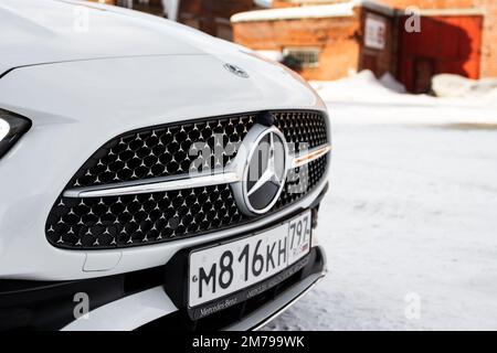 MOSCOW, RUSSIA - FEBRUARY 02, 2022. Mercedes-Benz C-Class 200 (W206) luxury sedan car close up view of grille. Grid of car. Radiator grille. Stock Photo