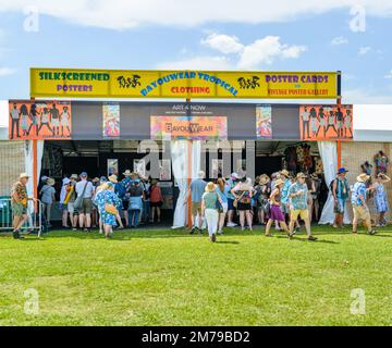 NEW ORLEANS, LA, USA - APRIL 29, 2022: Front of Bayouwear clothing tent, with shoppers, at the New Orleans Jazz and Heritage Festival Stock Photo