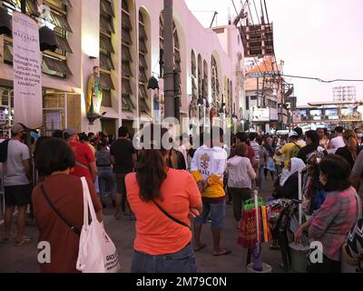 Manila, Philippines. 08th Jan, 2023. Nazarene devotees stand outside the Quiapo Church to listen to the mass. Catholic devotees flock to Quiapo Church in Manila to express their devotion to the Black Nazarene, a life-sized image of dark skinned, kneeling Jesus Christ carrying the cross. A day before it's feast on January 9. This festive activity was put on hold for two years because of the COVID-19 pandemic. (Photo by Josefiel Rivera/SOPA Images/Sipa USA) Credit: Sipa USA/Alamy Live News Stock Photo