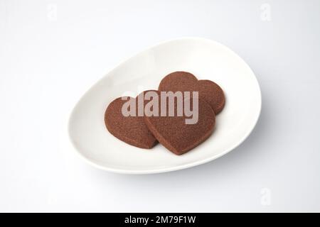 heart shaped chocolate cookies isolated on white background Stock Photo