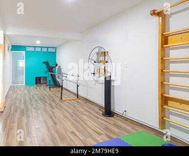 Different physiotherapy equipment in room Stock Photo - Alamy