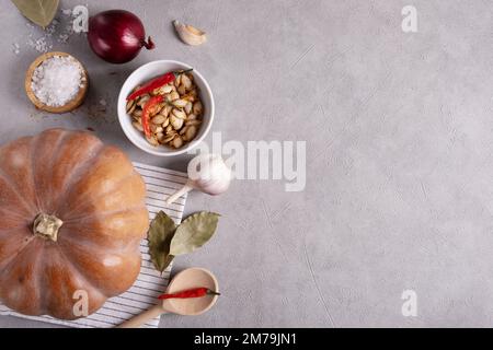Ripe musk gourd and various spices and ingredients Stock Photo