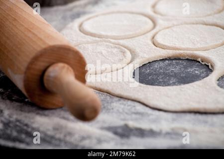 Traditional Polish dumplings. Homemade dumplings production Stock Photo