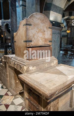 The Aachen Royal Throne is a throne erected in the 790s by order of Emperor Charlemagne, which forms the center of today's Aachen Cathedral Stock Photo