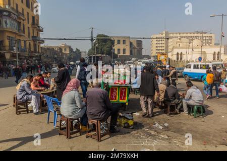 CAIRO, EGYPT - FEBRUARY 1, 2019: Street food stall in front of Ramses Railway Station in Cairo, Egypt Stock Photo