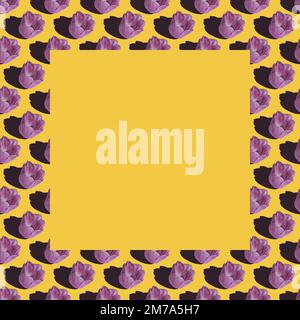 purple tulips pattern photo frame with yellow background and copy space Stock Photo