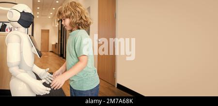 busy child interact with robot artificial intelligence, communication. Horizontal poster design. Web banner header, copy space. Stock Photo