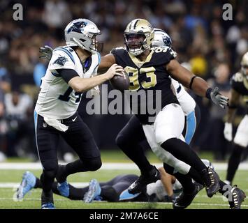 New Orleans, United States. 8th Jan, 2023. New Orleans Saints defensive tackle David Onyemata (93) flushes Carolina Panthers quarterback Sam Darnold (14) from the pocket at the Caesars Superdome in New Orleans on Sunday, January 8, 2023. Photo by AJ Sisco/UPI. Credit: UPI/Alamy Live News Stock Photo