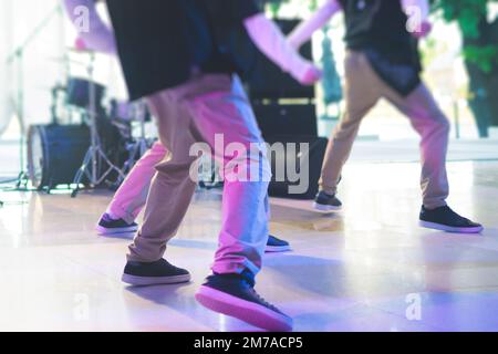Group of hip-hop dancers performance on a stage, modern contemporary street dance with break dancing in studio, hip hop dance training  in a ballroom, Stock Photo