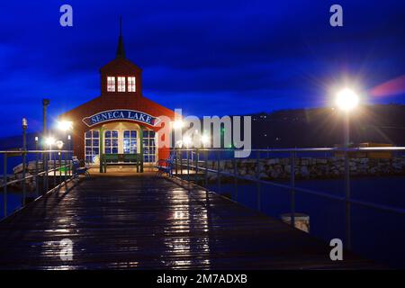 A small boathouse stands at the end of the pier in Watkins Glen, New York Stock Photo