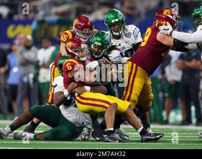 Arlington, TX, USA. 2nd Jan, 2023. USC Trojans running back Austin Jones (6) struggles for more yardage during the Goodyear Cotton Bowl game between the Tulane Green Wave and the University of Southern California Trojans on January 2, 2023 at AT&T Stadium in Arlington, Texas. (Mandatory Credit: Freddie Beckwith/MarinMedia.org/Cal Sport Media) (Absolute Complete photographer, and credits required).Television, or For-Profit magazines Contact MarinMedia directly. Credit: csm/Alamy Live News Stock Photo