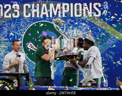 Arlington, TX, USA. 2nd Jan, 2023. Tulane Green Wave head coach Willie Fritz celebrates with his MVPs during the Goodyear Cotton Bowl game between the Tulane Green Wave and the University of Southern California Trojans on January 2, 2023 at AT&T Stadium in Arlington, Texas. (Mandatory Credit: Freddie Beckwith/MarinMedia.org/Cal Sport Media) (Absolute Complete photographer, and credits required).Television, or For-Profit magazines Contact MarinMedia directly. Credit: csm/Alamy Live News Stock Photo