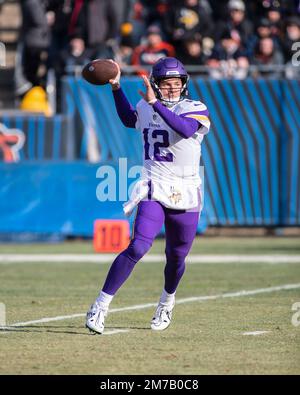 Minnesota Vikings quarterback Nick Mullens (12) signals teammates