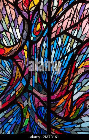 Montpellier, France - 01 05 2023 : Detail view of bright and colorful modern stained glass inside Don Bosco catholic church Stock Photo