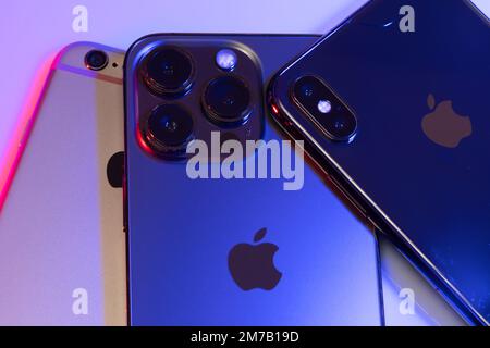 South Tyrol, Italy - Jan. 7. 2023: Different Apple iPhone models, from iPhone 6, X 10 to iPhone 13 Pro Stock Photo