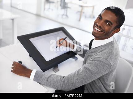 Smart technology makes everything easier. A young man working on a large touchscreen. Stock Photo
