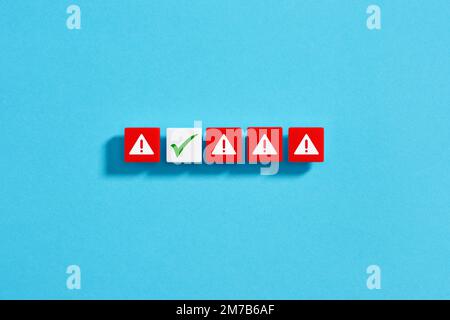 System error correction and bug fixing. Debugging the system failure. Choosing the right option among the risky ones. Risk management. White blocks wi Stock Photo