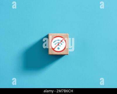 No internet access. No wireless connection. Wi-fi signal unavailable. No Wi-Fi sign on a wooden cube. Stock Photo