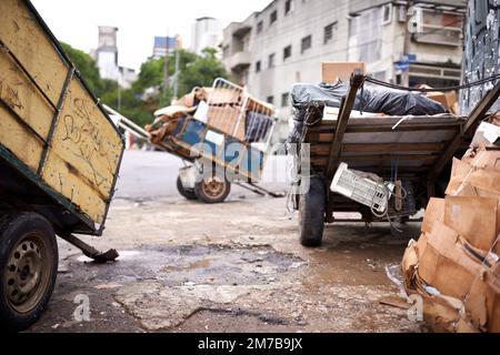 Garbage collection. carts full of garbage in the street of a poverty-stricken city. Stock Photo