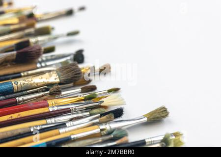 Close-up, brushes for drawing on a white background. Stock Photo