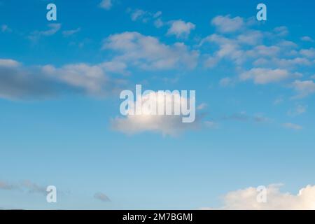 Small clouds in a blue sky Stock Photo