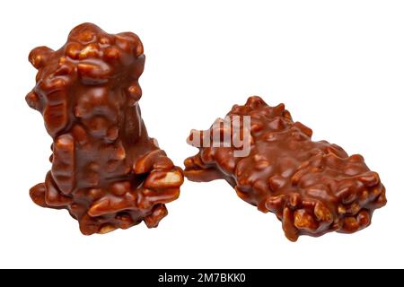 Chocolate candy with nuts isolated on a white background. Clipping path. Almond and nut slivers embedded in milk chocolate. Stock Photo