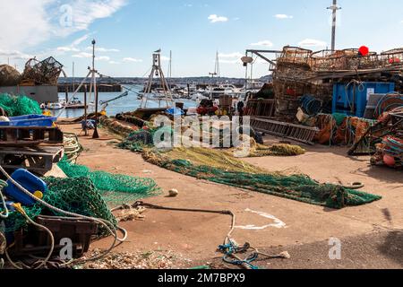 Fishing nets and floats on the dockside at a commercial dock Stock Photo -  Alamy