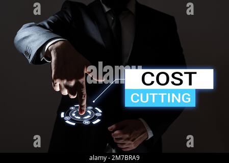 Text sign showing Cost Cutting. Word Written on Measures implemented to reduced expenses and improved profit Stock Photo