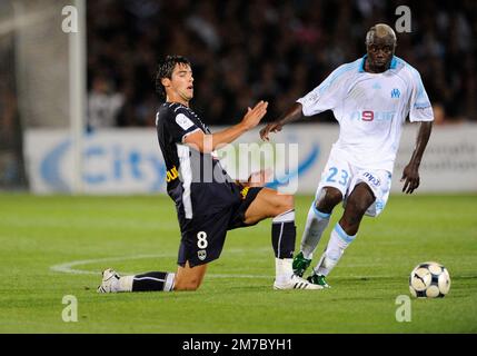 File photo dated September 13, 2008 of Bordeaux' Yoann Gourcuff and Marseille's Modeste M'bami battle for the ball during the First French soccer league, FC Girondins Bordeaux vs Olympique Marseille at the Chaban-Delmas stadium in Bordeaux, France. The match ended in a 1-1 draw. Former Paris-Saint-Germain and Cameroon midfielder Modeste M’Bami has died aged 40 after suffering a heart attack, PSG said in a statement on Saturday. M’Bami won two Coupes de France with the Parisian club, in 2004 and 2006, as well as an Olympic gold medal with Cameroon at the 2000 Sydney Games. At those Olympics, M’ Stock Photo