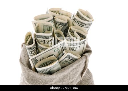 money bag full of 100 dollar bills Stock Photo